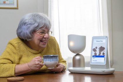 ElliQ 3.0 from Intuition Robots interacts with user Gloria over coffee.