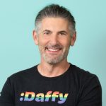 Man wearing black t-shirt that reads