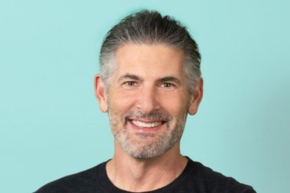 Man wearing black t-shirt that reads